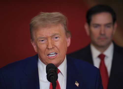 President Donald Trump speaks from the East Room of the White House in Washington, Saturday, June 21, 2025, after the U.S. military struck three Iranian nuclear and military sites, directly joining Israel's effort to decapitate the country's nuclear program, as Secretary of State Marco Rubio listens. (Carlos Barria/Pool via AP)