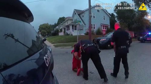 A US police department is investigating after officers handcuffed 11-year-old twins and a 17-year-old family friend at gunpoint.