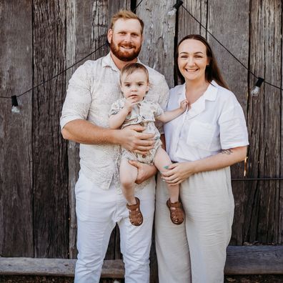 Breanna Tottle with her husband and young son.