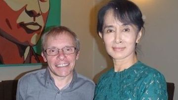 Sean Turnell and Aung San Suu Kyi in his LinkedIn bio photo