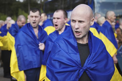 Ukrainian soldiers respond aft returning from captivity during an speech betwixt Russia and Ukraine