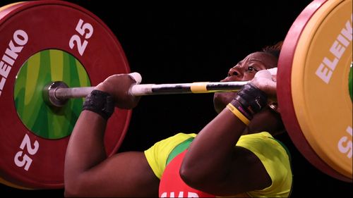 Arcangeline Fouodji Sonkbou of Cameroon during the women's 69kg weightlifting competition. (AAP)