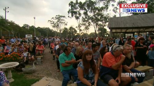 Hundreds of locals turned out to protest against the move. (9NEWS)