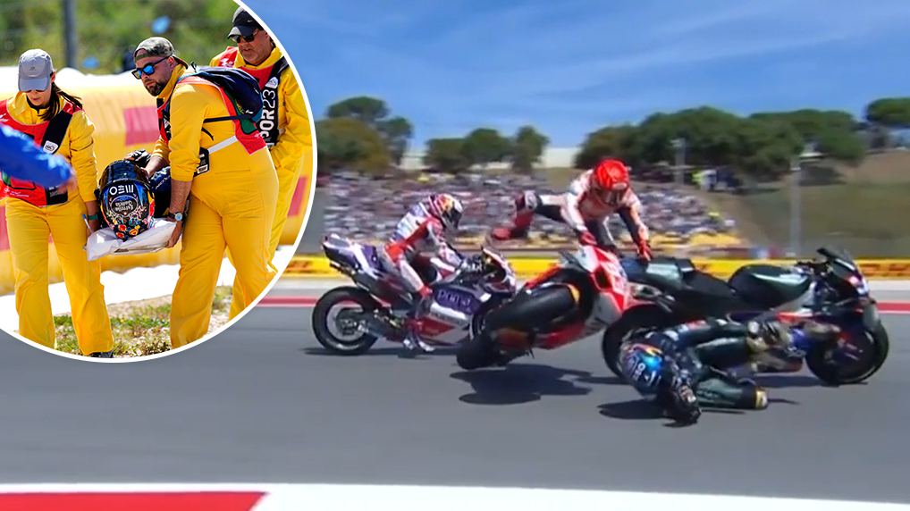 Miguel Oliveira is carried on a stretcher following a multi-bike crash.