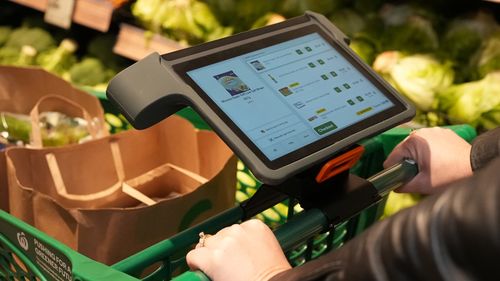 Woolworths is expanding the roll-out of its digital supermarket trolley, allowing thousands of customers to track their spending in real-time.