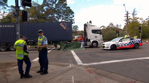 A female pedestrian has died in Sydney's north today after she was struck by a truck on a busy road. Picture: 9NEWS.