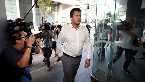 Gable Tostee leaves the Supreme Court in Brisbane.