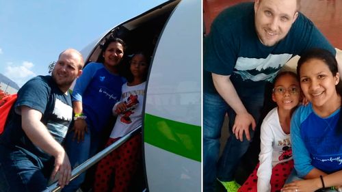 In this image provided by the Holt family, Joshua Holt, his wife Thamara and her daughter, board a plane at the airport in Caracas, Venezuela. (AAP)