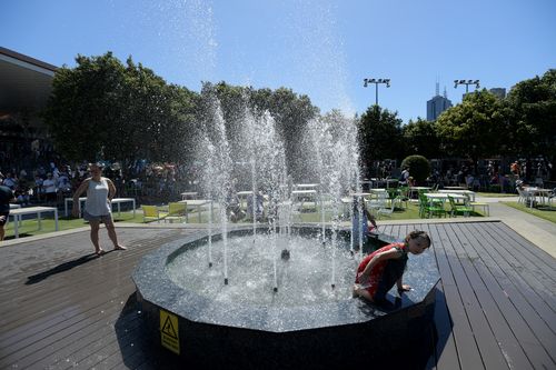People in Adelaide and Melbourne sought out any source of water they could to try and keep the heat down during the rising temperatures (AAP).