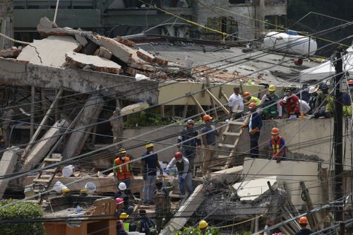 Search and rescue efforts continue at the Enrique Rebsamen school that collapsed after an earthquake in Mexico City. (AP)
