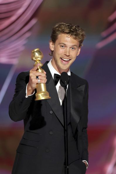  Austin Butler accepting the Best Actor in a Motion Picture  Drama award for "Elvis" during the 80th Annual Golden Globe Awards