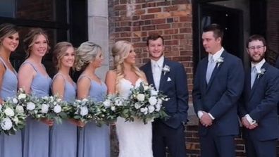 Bridal party laughing during photos