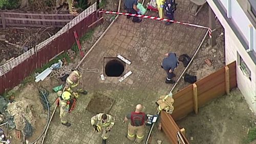 Firefighters have rescued a teenager who was trapped for more than an hour.