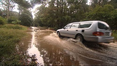 Parts of the Sunshine Coast have been hit with more than 100mm of rain in just one hour. (9NEWS)