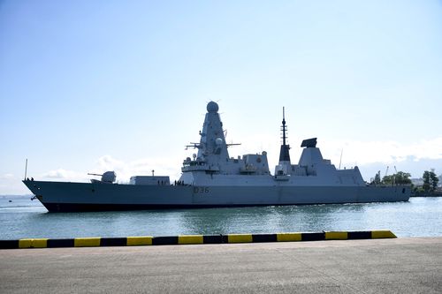 British destroyer HMS Defender arrives at the port of Batumi, in Georgia, on June 26, 2021. Moscow said one of its warships fired warning shots and a warplane dropped bombs in the path of British destroyer Defender last week to force her out of an area near Crimea that Russia claims as its territorial waters. Britain denied that account.