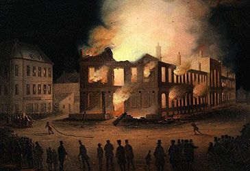 Where was the Province of Canada's legislature when rioters burned it down in 1849?