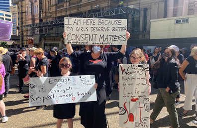 Alison Hallworth at March 4 Justice with daughters Cassidy and Tully.