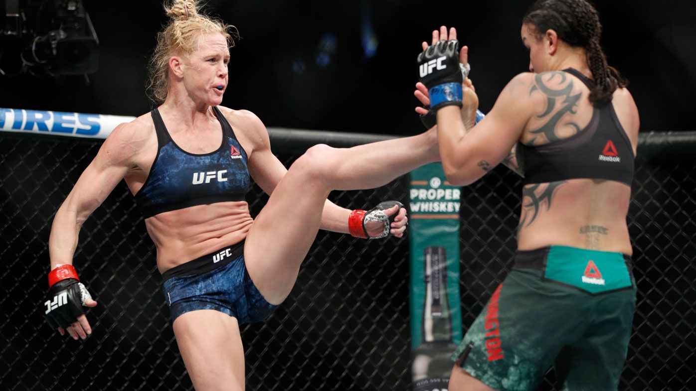 Holly Holm kicks Raquel Pennington during a UFC 246 women&#x27;s bantamweight