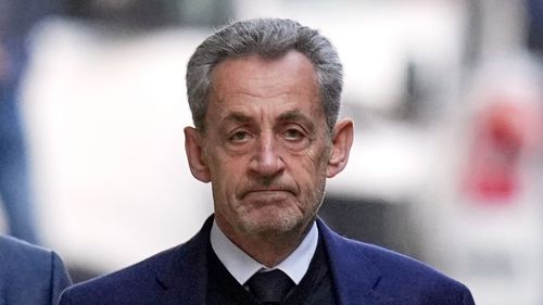 FILE - Former French President Nicolas Sarkozy Nicolas Sarkozy pictured back in October leaving his home to go to prison. He has now been released pending appeal.