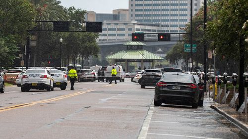 Police have barricaded a street near Jacksonville Landing.