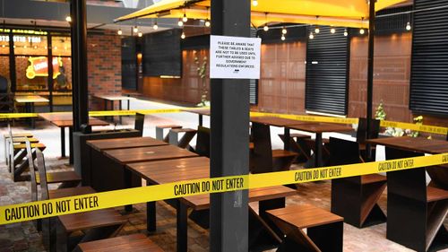 Tables are blocked off at a Melbourne restaurant.