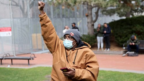 People react outside the Hennepin County Government Centre after the verdict was read in the Derek Chauvin trial 