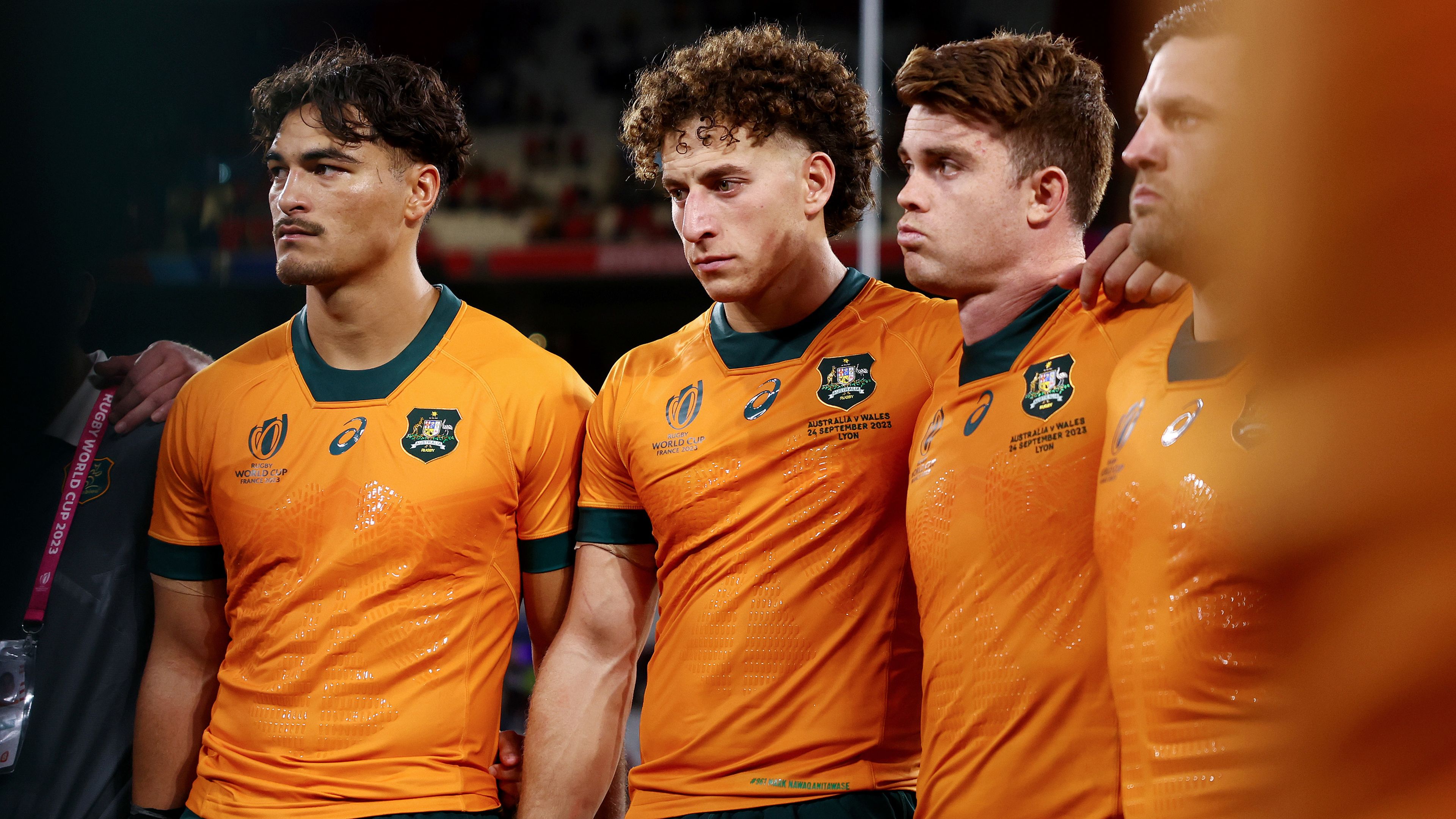 (From left) Jordan Petaia (23), Mark Nawaqanitawase (23), and Andrew Kellaway (27) looks dejected after losing to Wales.