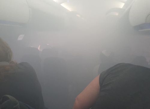 Photo from the BA flight shows how thick white smoke engulfed the entire cabin. Image courtesy: Lucy Brown, Twitter