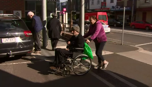 The wheelchair-bound grandfather has broken down in tears, recalling the moment he was viciously bashed during a random mugging.