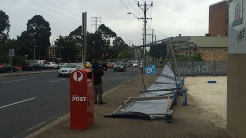 UPDATE: Wind gusts of up to 106km/h batter Adelaide, bring down trees, powerlines