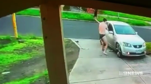 The brave effort was captured on CCTV as the tradie tried to get the alleged car thief out of his vehicle.