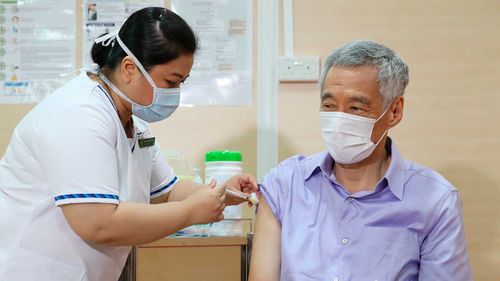 Singaporean Prime Minister Lee Hsien Loong gets a COVID-19 vaccine.
