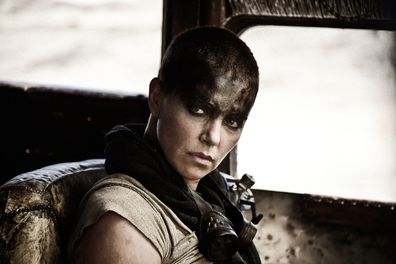 This photo provided by Warner Bros. Pictures shows Charlize Theron as Imperator Furiosa in Warner Bros. Pictures and Village Roadshow Pictures action adventure film, Mad Max: Fury Road," a Warner Bros. Pictures release. 