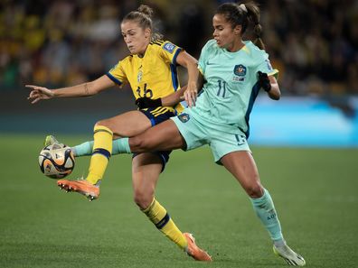 Mary Fowler tries to steal the ball from a Swedish opponent during last year's World Cup.