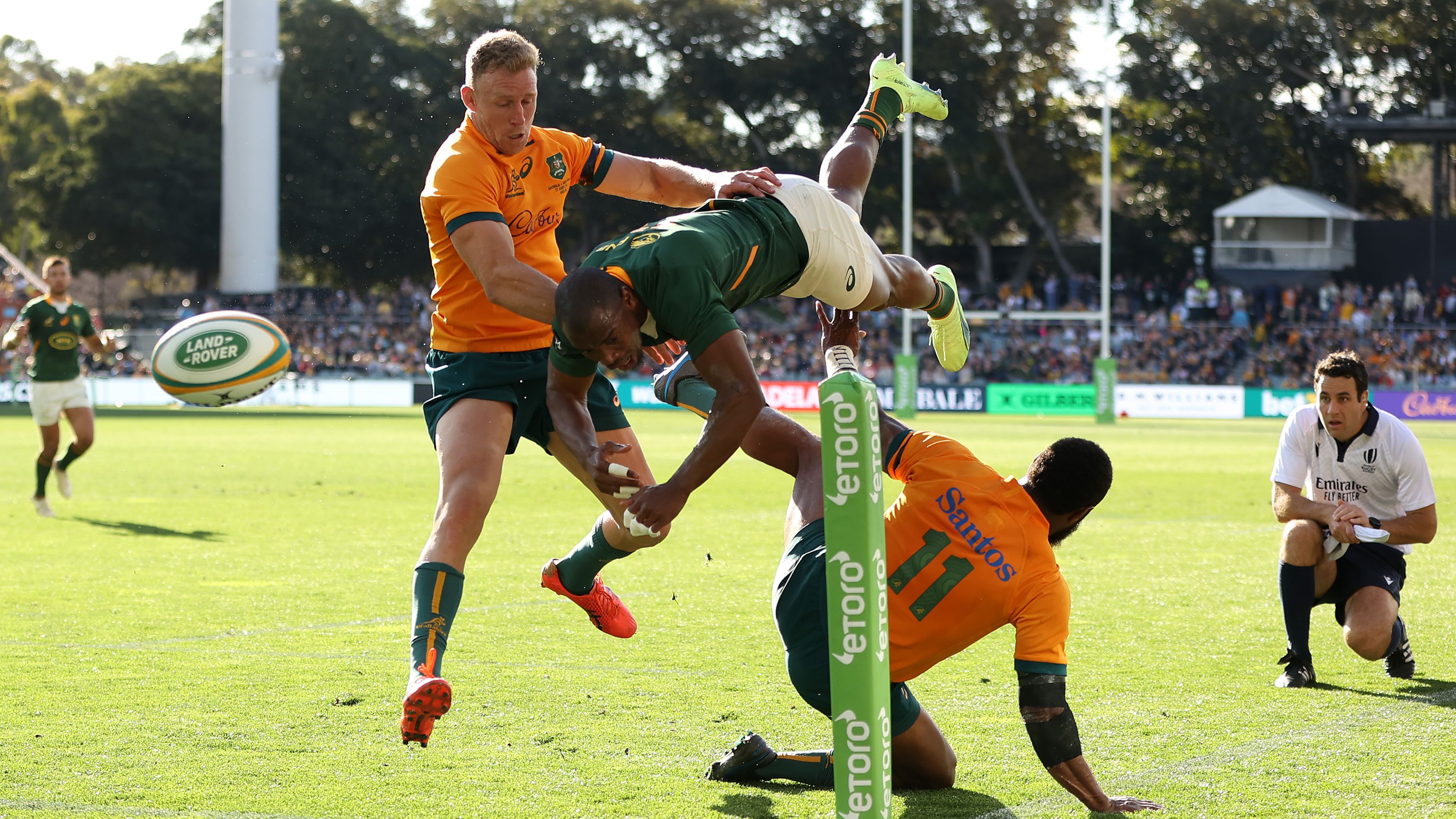Makazole Mapimpi of the Springboks is tackled by Marika Koroibete of the Wallabies.