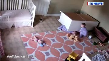 9RAW: Heart stopping moment chest of drawers falls on two-year-old twins caught on camera
