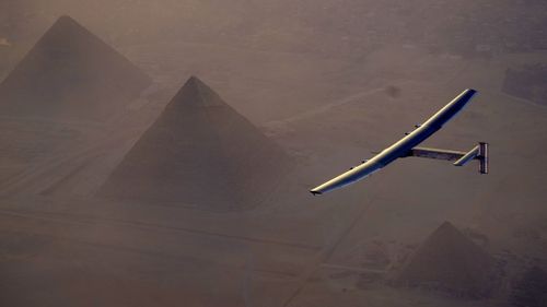 Solar Impulse 2 lands in Abu Dhabi, becoming the first plane to circle the globe without fuel