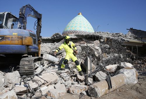 Earlier this week, survivors were pulled from this rubble of a mosque that collapsed while people were praying. Picture: AAP.