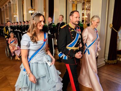 From left, Norway's Princess Ingrid Alexandra, Crown Prince Haakon and Crown Princess Mette-Marit on their way to a gala dinner at the Palace in connection with the state visit of the Icelandic presidential couple, in Oslo, Tuesday, April 8, 2025. (Fredrik Varfjell/NTB via AP)