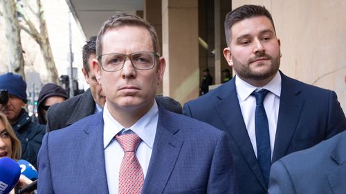 Police officers James Fitzgerald  and Alexander Papanastassis appeared in court after they were charged over the death of a man during an arrest.
