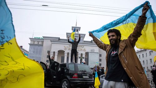 Crowds celebrated the liberation of the city after Ukrainian forces swept into the city and Russian troops retreated to the east.