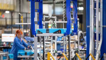A robot on the manufacturing line at Amazon Robotics BOS27 on Thursday, November 10, 2022, in Westborough, Massachusetts.