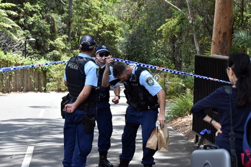 Police could be seen taking evidence bags to their cars this afternoon.