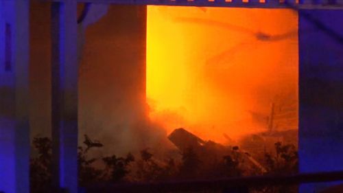 A woman and boy made a run for it when their Sydney home went up in flames last night.