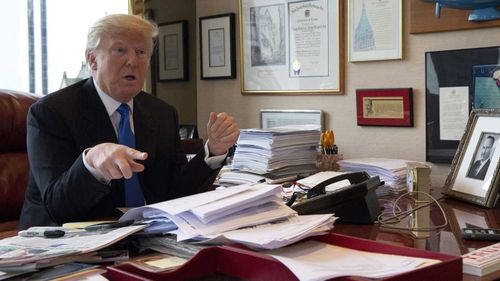 Donald Trump in his office. (AAP)