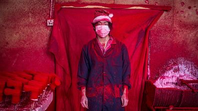 <p>These are Santa’s real helpers – thousands of kilometres away from the North Pole and working in conditions that are not too jolly.</p><p>
AP photographer Yang Guang has captured in a rare look inside a "Christmas Village" in China's Zhejiang province, filled with “red factories” that produce Christmas products for the whole world. </p><p>
(All images AAP)</p>