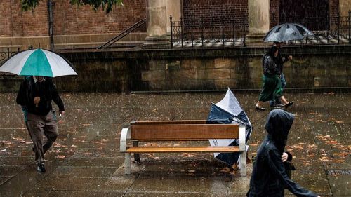 Rain falling over Sydney.