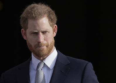 Britain's Prince Harry arrives in the gardens of Buckingham Palace in London, Thursday, Jan. 16, 2020. Prince Harry, the Duke of Sussex will host the Rugby League World Cup 2021 draw at Buckingham Palace, prior to the draw, The Duke met with representatives from all 21 nations taking part in the tournament, as well as watching children from a local school play rugby league in the Buckingham Palace gardens. (AP Photo/Kirsty Wigglesworth)