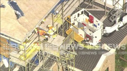A construction worker fell from the roof of a building in Perth today. Picture: 9NEWS.
