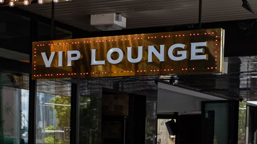 Signage such as this 'VIP lounge' on Oxford street, Darlinghurst, will have to be removed within three months under the new legislation.